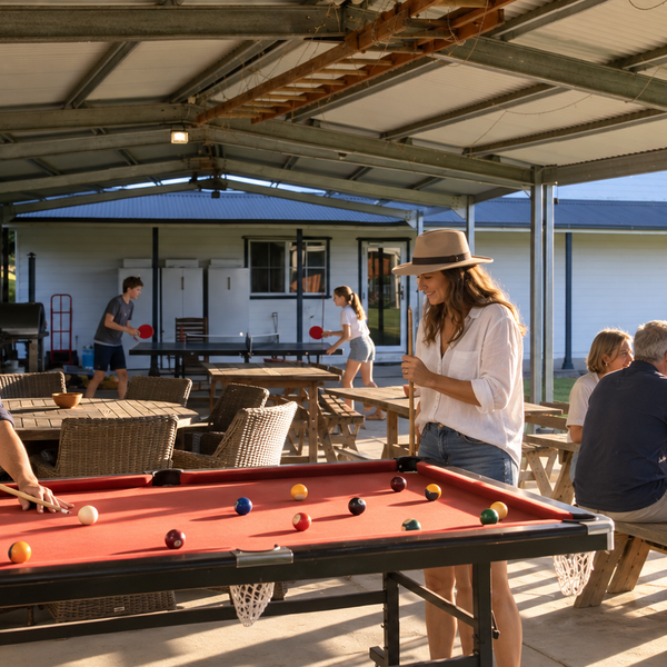 Guests enjoying pool, table tennis and covered activity spaces at Berrima Retreat