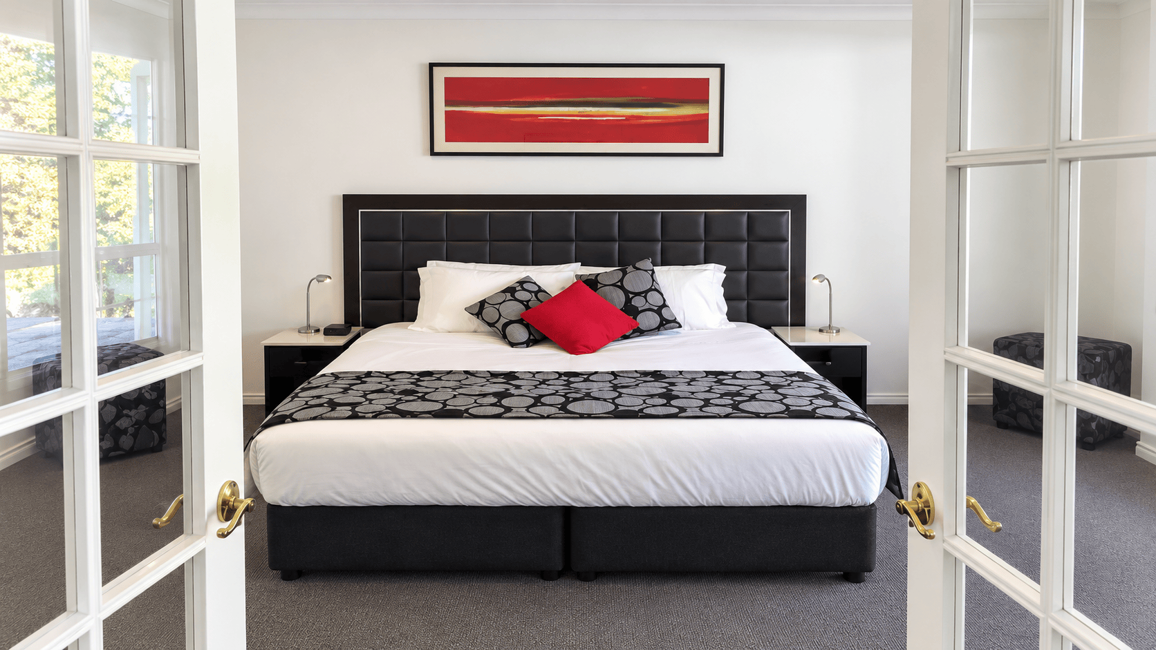 Spacious guest bedroom with a king bed at Berrima Retreat in the Southern Highlands