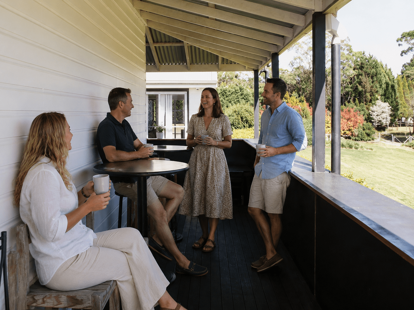 family members enjoying coffee outside